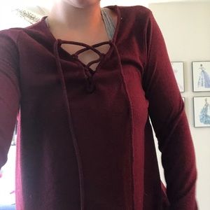 Red tie up sweater